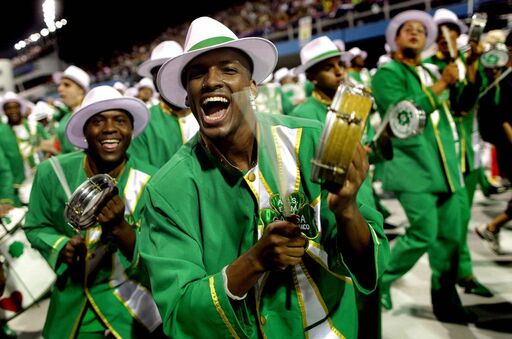 Drummers perform during the Carnival parade of the Camisa Verde e Branco samba school in Sao Paulo. (Andre Penner/Associated Press)